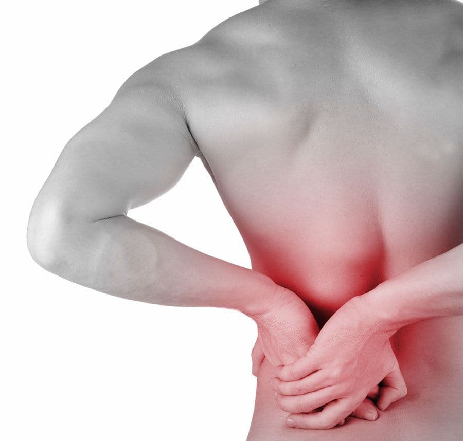 Person holding their lower back